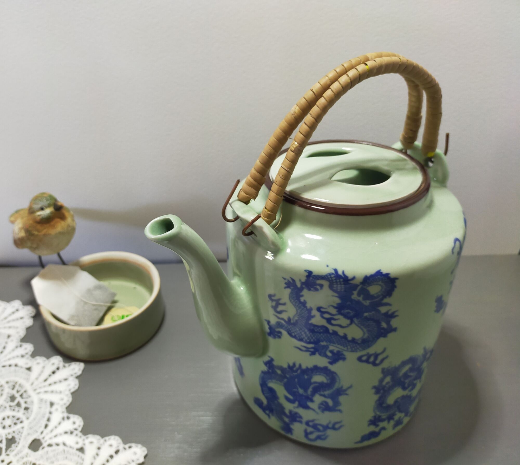 rare green celadon teapot ancient dragons or phoenix decoration with glaze and wicker handles signed /th