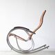 Vintage Thonet rocking chair in chrome and rattan, 1970.