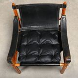 Fauteuil lounge Sirocco Safari d'Arne Norell en palissandre et cuir noir, Suède