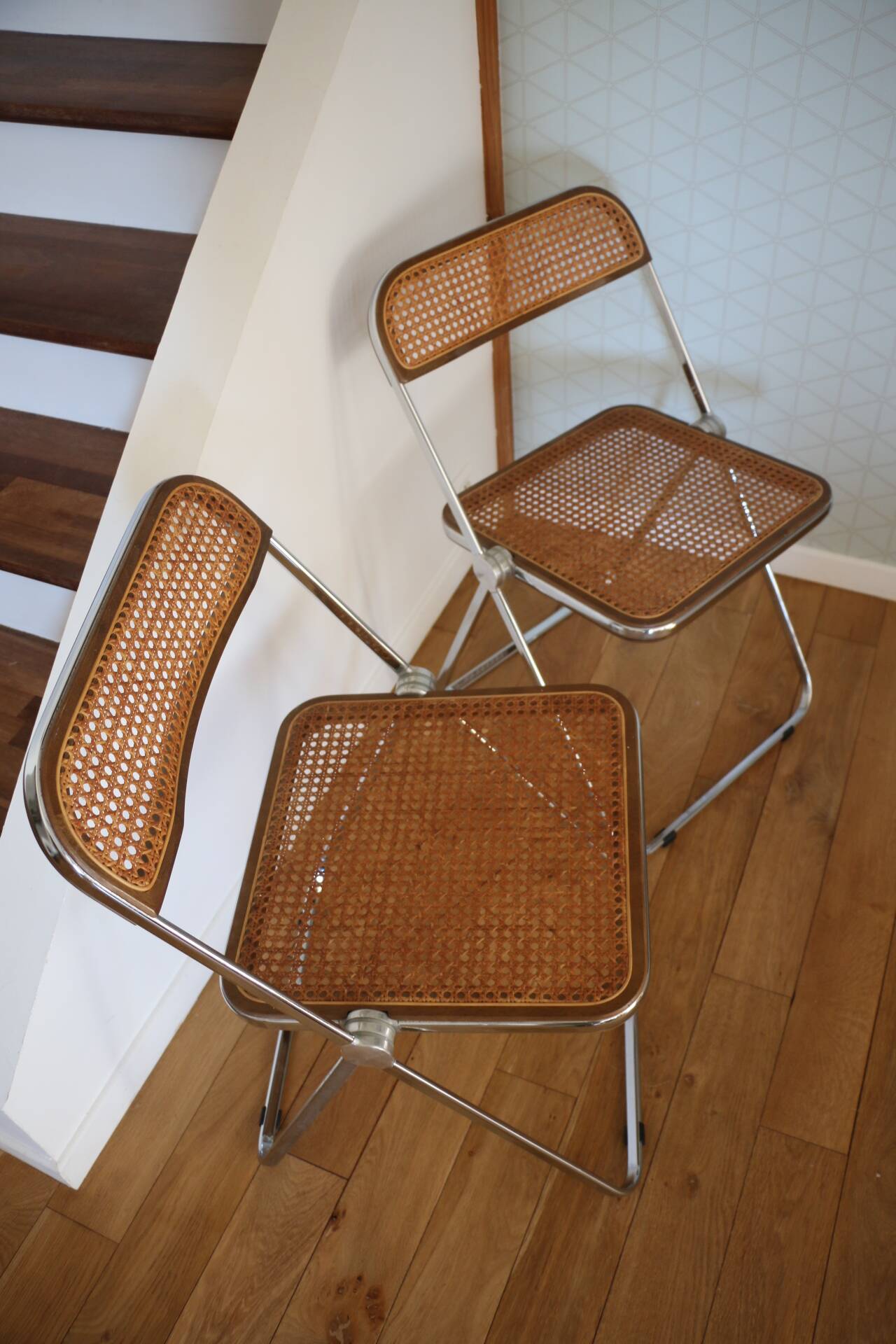 2 plia rattan chairs by piretti
