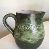 Incised glazed earth pitcher