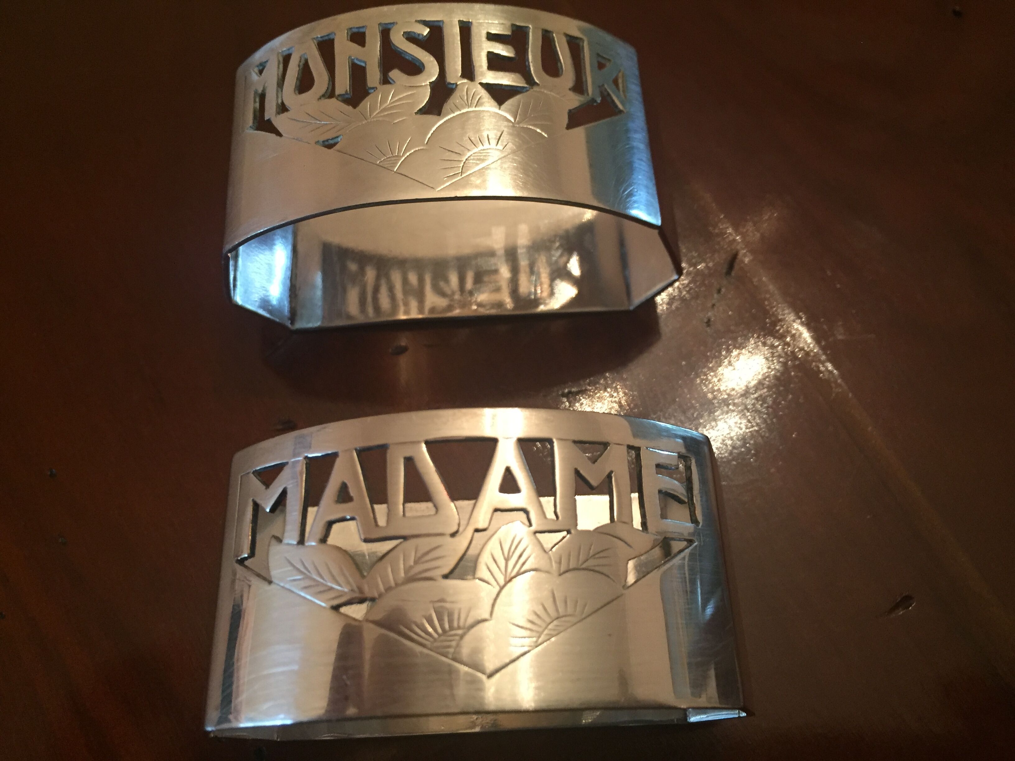 2 Old silver towel rounds