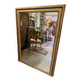 Giled and black fireplace mirror