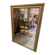 Giled and black fireplace mirror