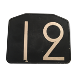 Plaque ancienne de ligne de bus en bakélite n° 12