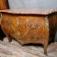 Curved Louis XV style commode with marquetry from around 1880.