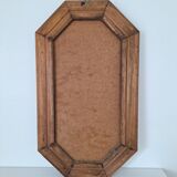 Octagonal wooden mirror from the 1980s.
