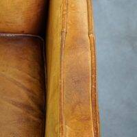 Set of English style light cognac colored leather armchairs.