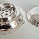 Antique butter dish in the Coquillor style, made of silver-plated metal.