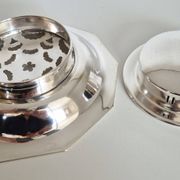 Antique butter dish in the Coquillor style, made of silver-plated metal.