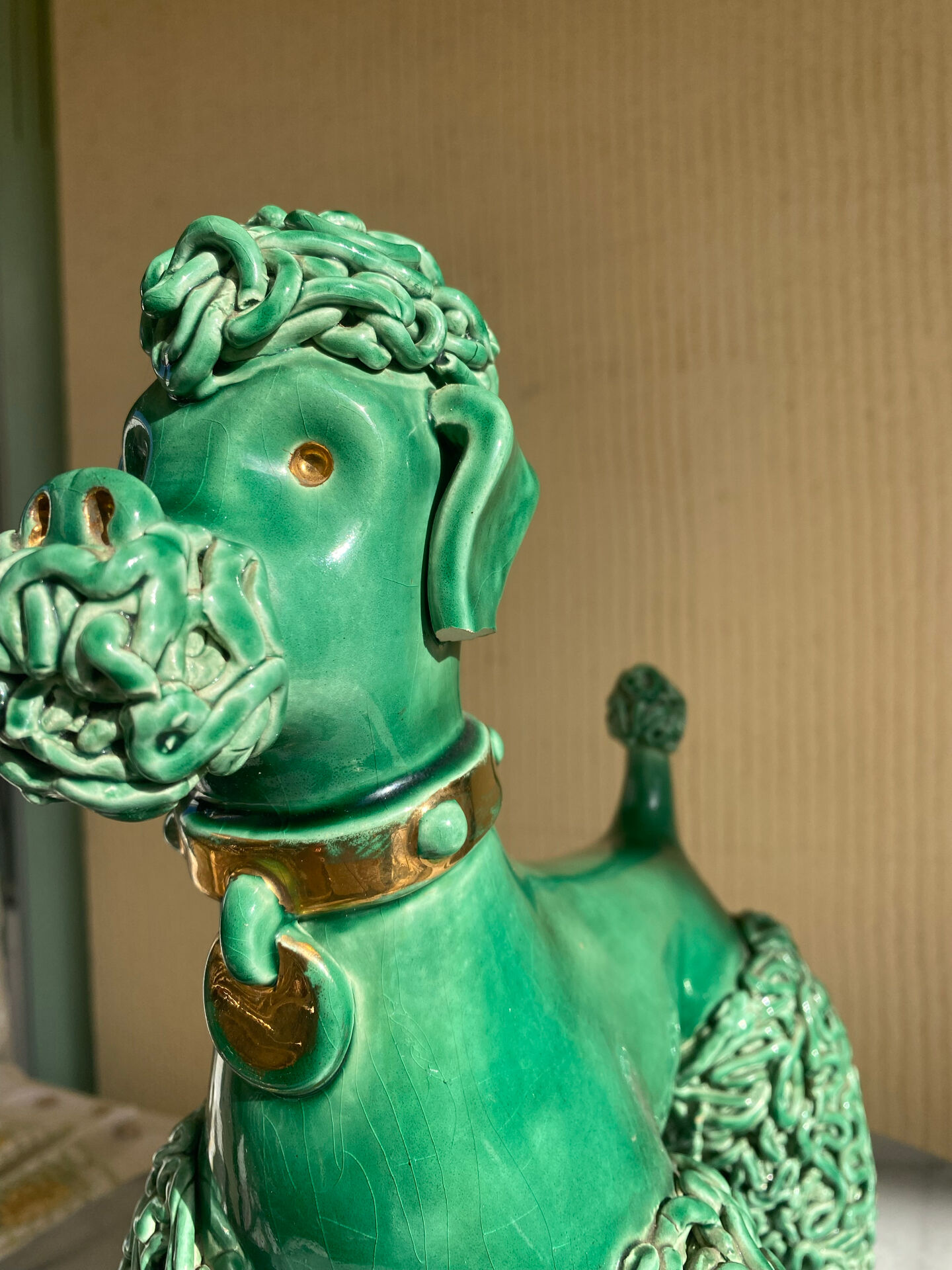 Large green glazed ceramic spaghetti poodle from the 60s.
