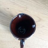 Flamed ceramic pitcher