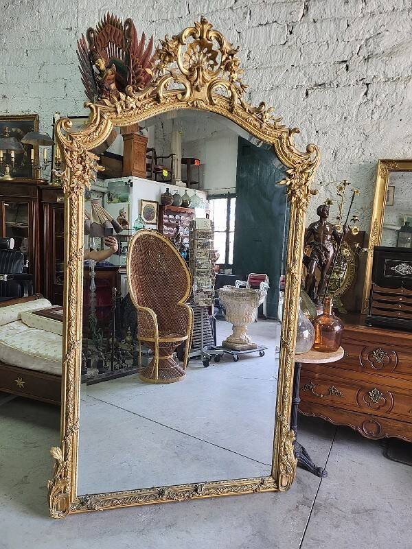 Large Louis XV gilded shell mirror from the 19th century
