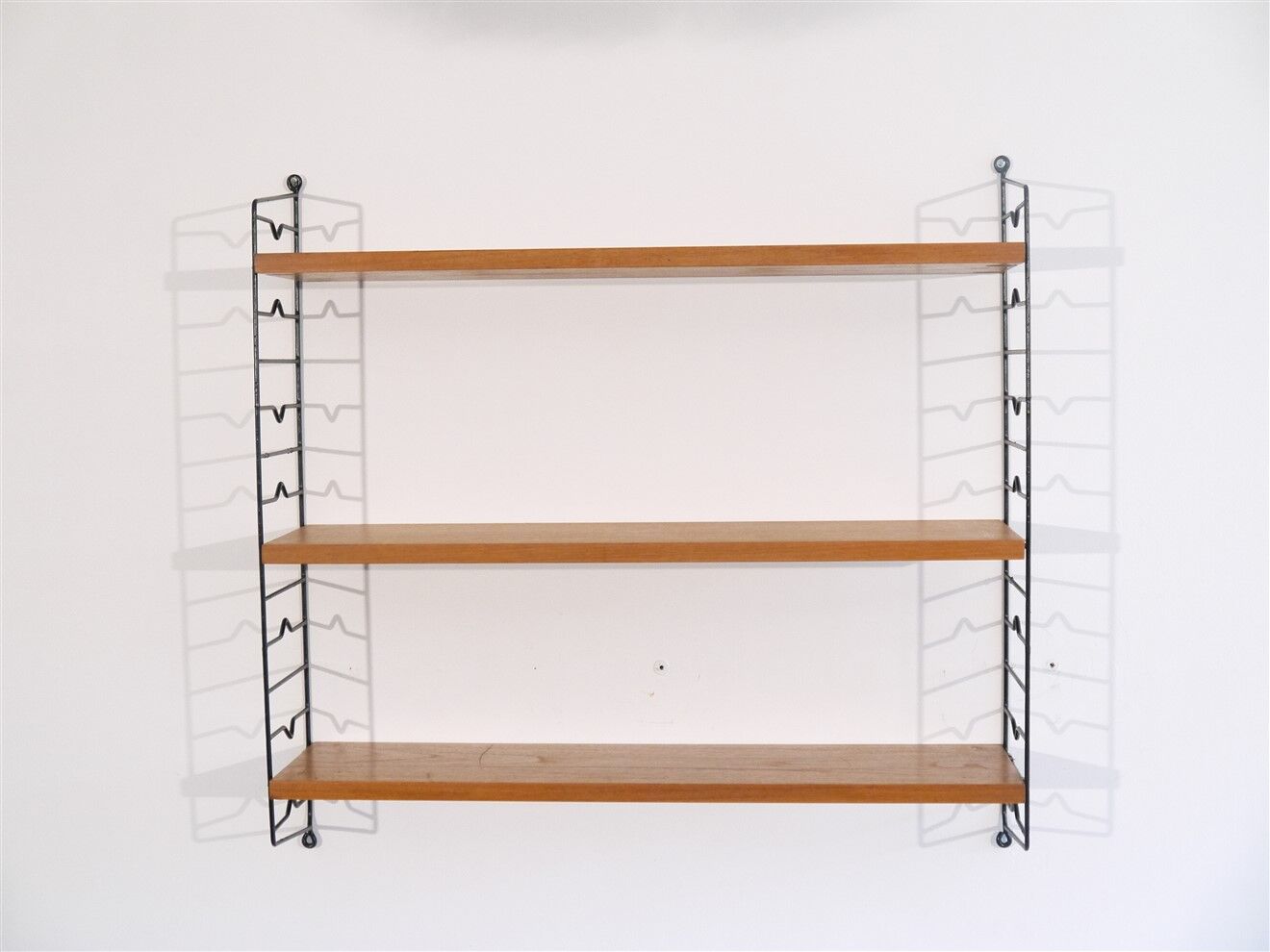 Scandinavian vintage shelf in teak "string" 1960