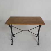 Bistro table with an oak top on a cast iron base, 1930s.