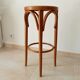 Vintage curved wooden high stool and tanned seat