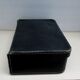 Small suitcase in old navy blue cardboard