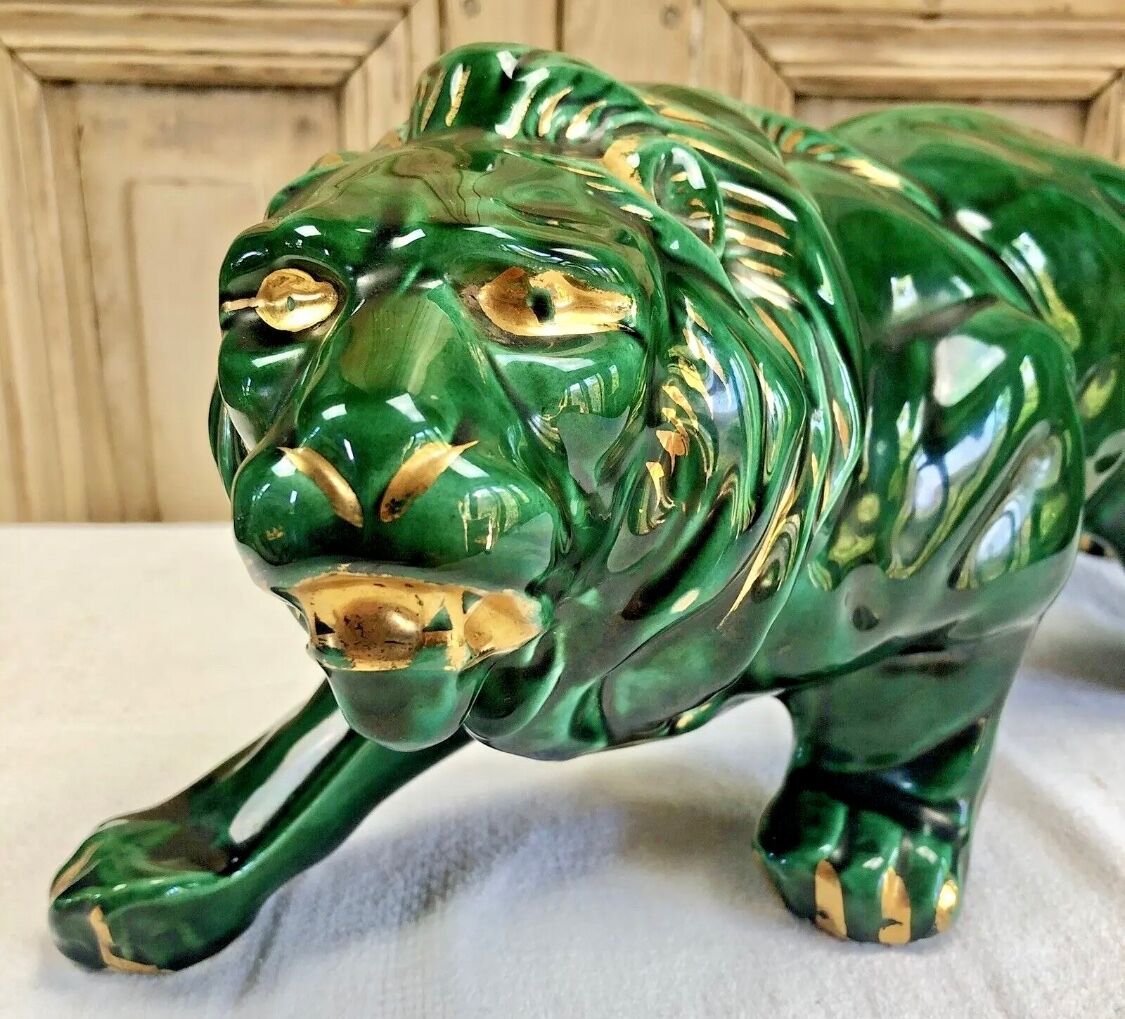 Art Deco lion statue cracked St Clement