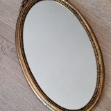 Oval golden mirror 41x23