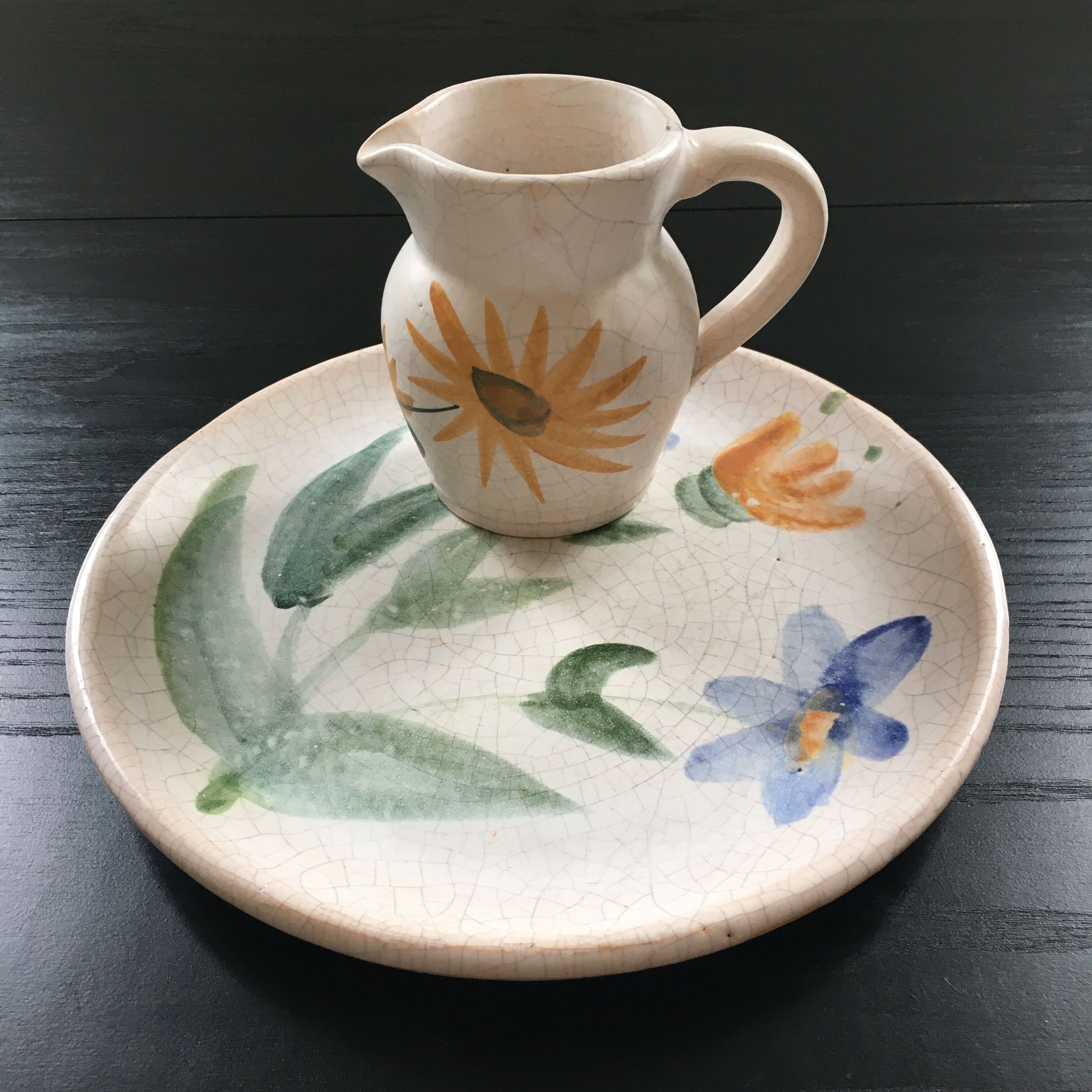 Set plate and jug with floral decoration.