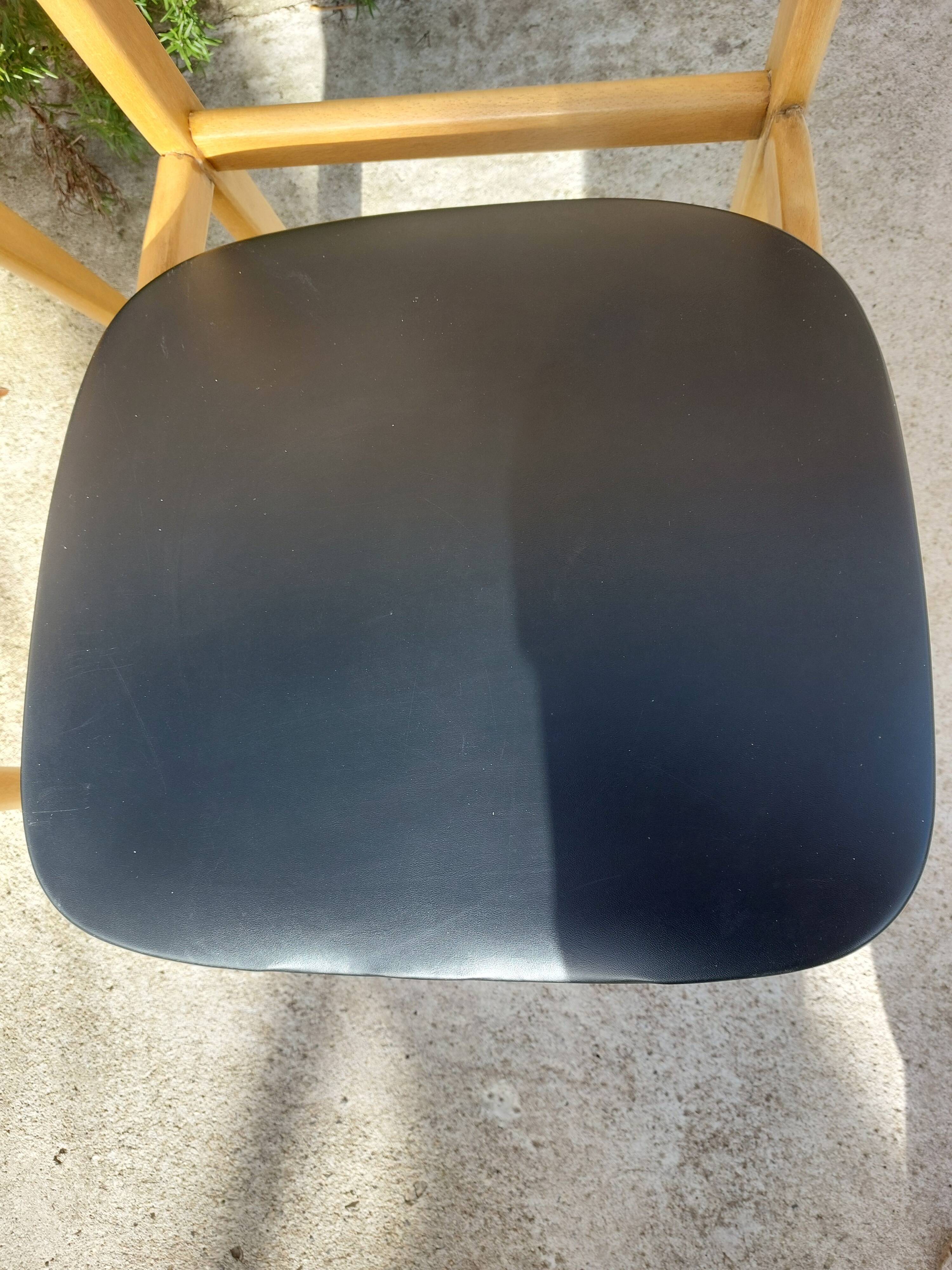 5 Scandinavian style chairs, wood and black faux leather.