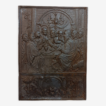 Iron fireback plate with relief biblical scene of the last supper, late renaissance xvi-xvii century style
