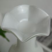 Corolla vase in white opaline with orange-brown patterns.