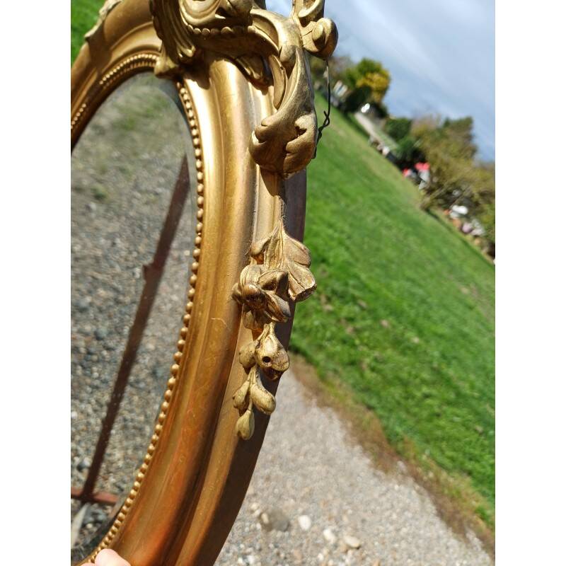 Miroir ovale en bois et stuc doré 19ème