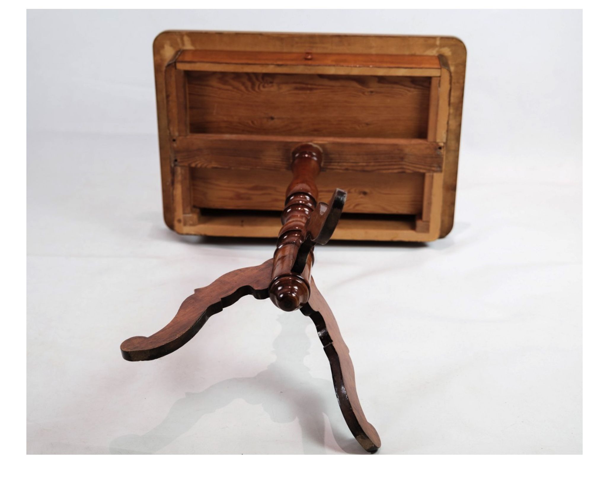 Side table on a mahogany pillar from around the year 1850s