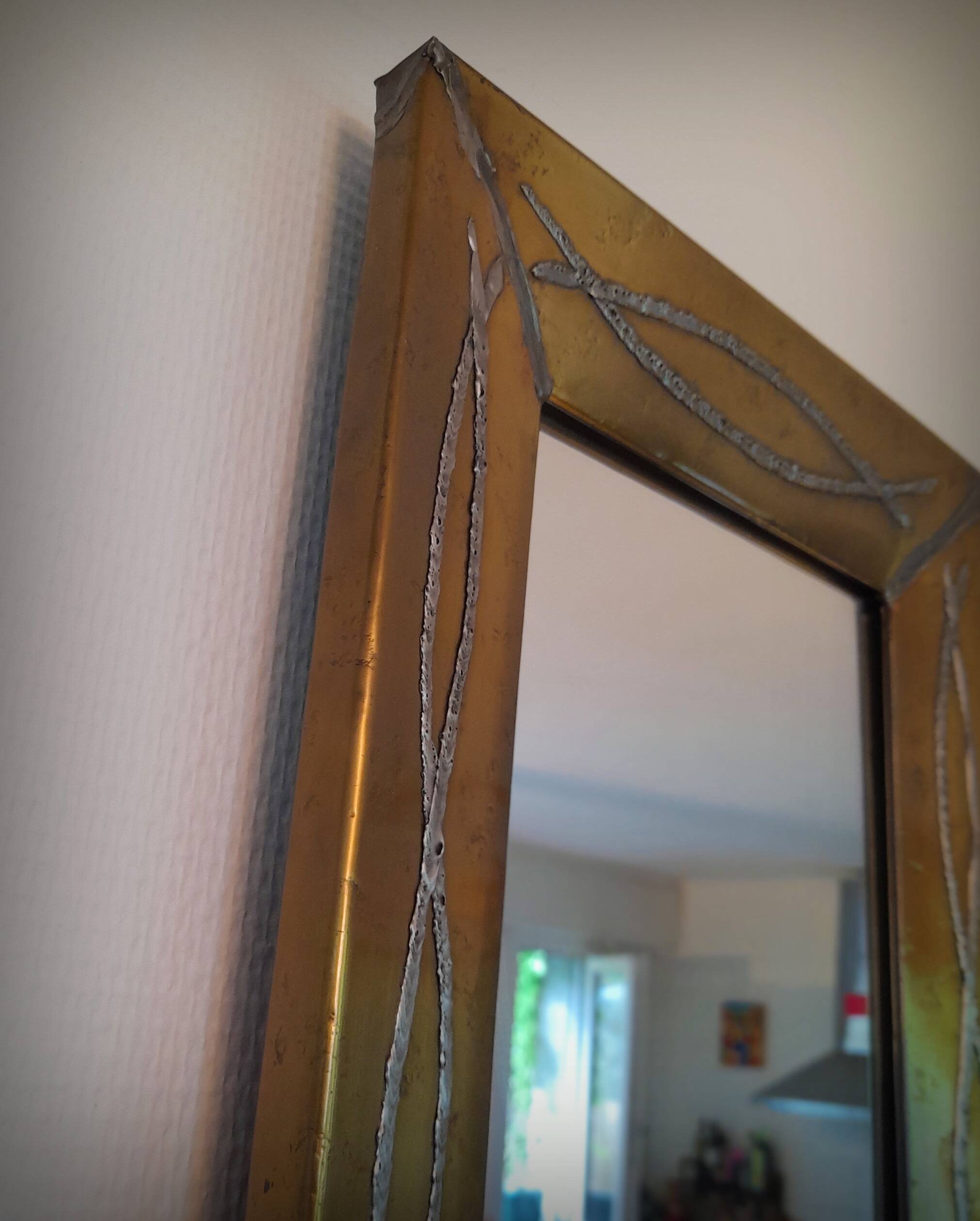 Brutalist brass mirror by Jean Goardere, France, 1970s