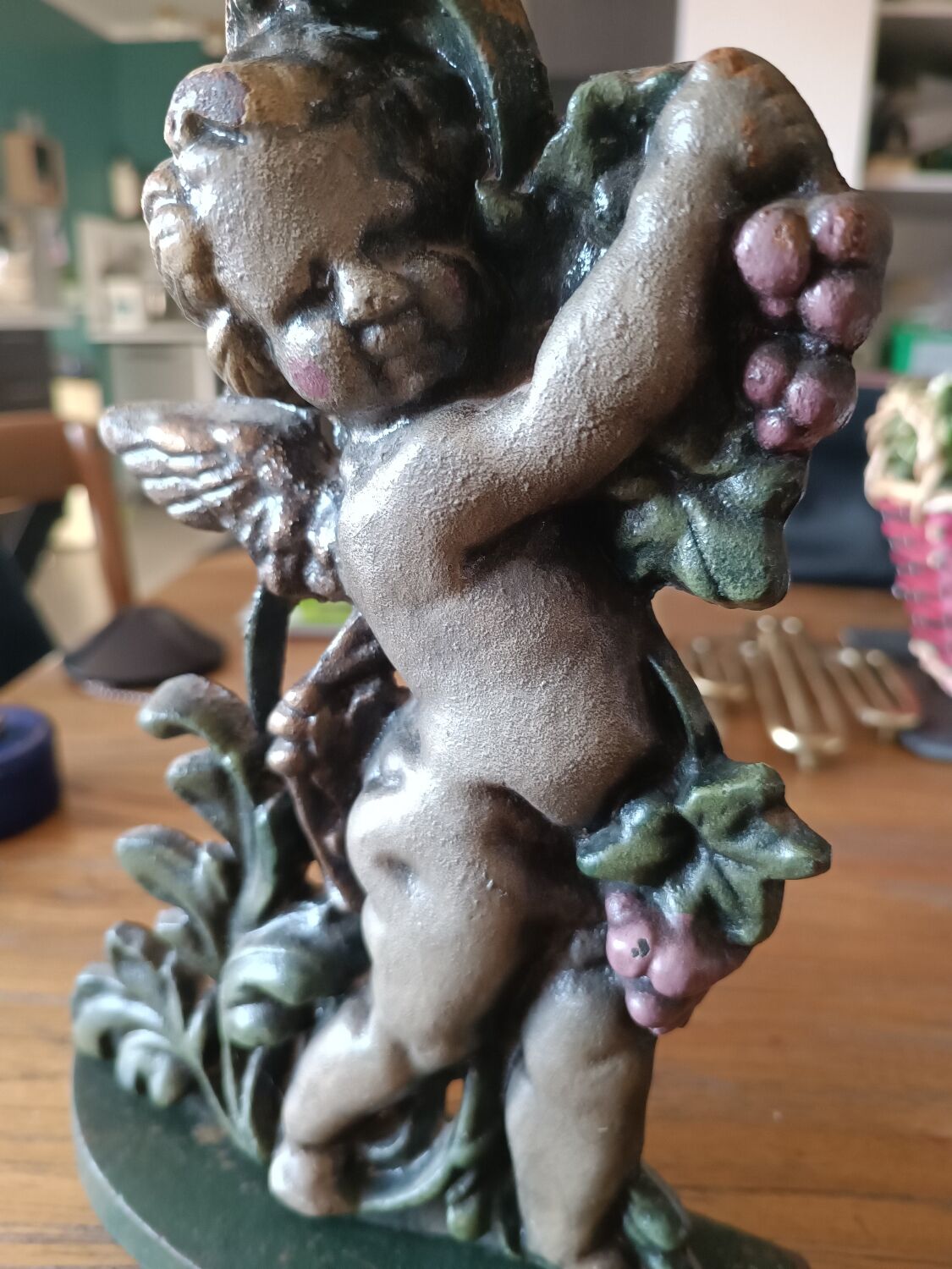 Cast iron door block cherub
