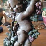 Cast iron door block cherub