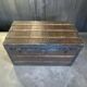 Vintage wooden coffee table with iron fittings.