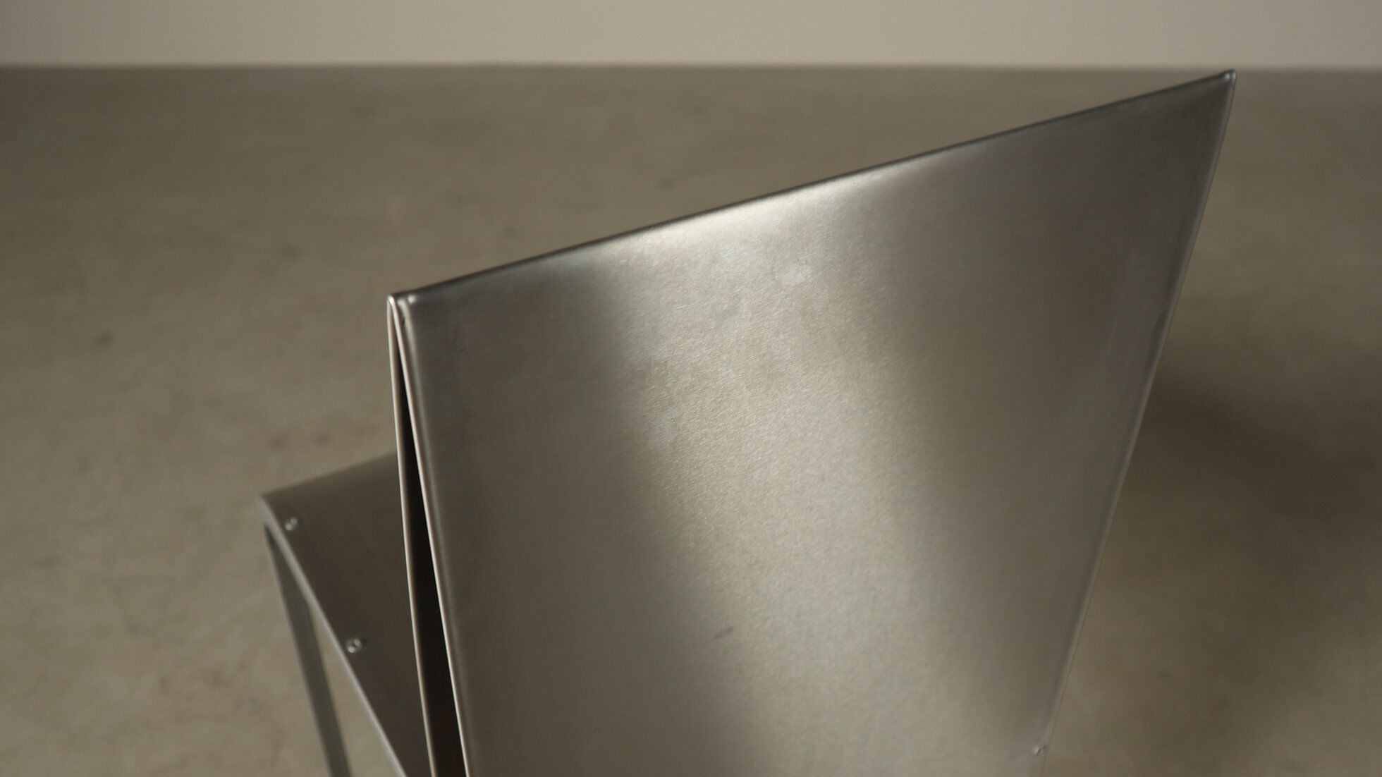 Set of six postmodernist stainless steel dining chairs from circa 1980-1990.