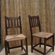 Pair of antique straw-seated farm chairs