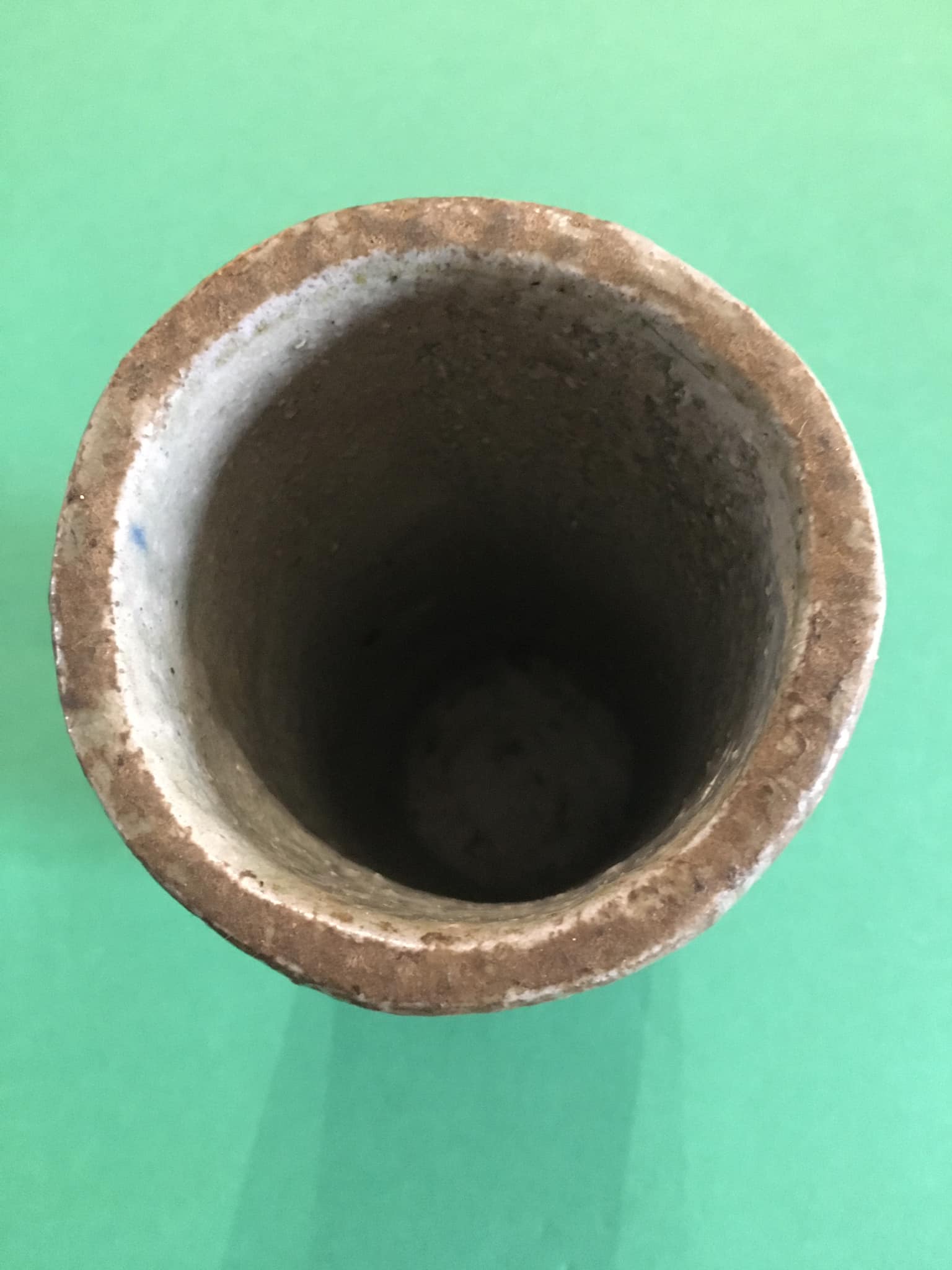 Sandstone scroll vase signed Jean Claude Monange, daisy motif