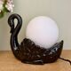 Vintage lamp, black ceramic swan and white opaline globe