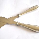 Two antique service knives in silver-plated metal, pearl frieze gowe alpacca.