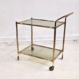 Golden metal dessert with tinted glass tops