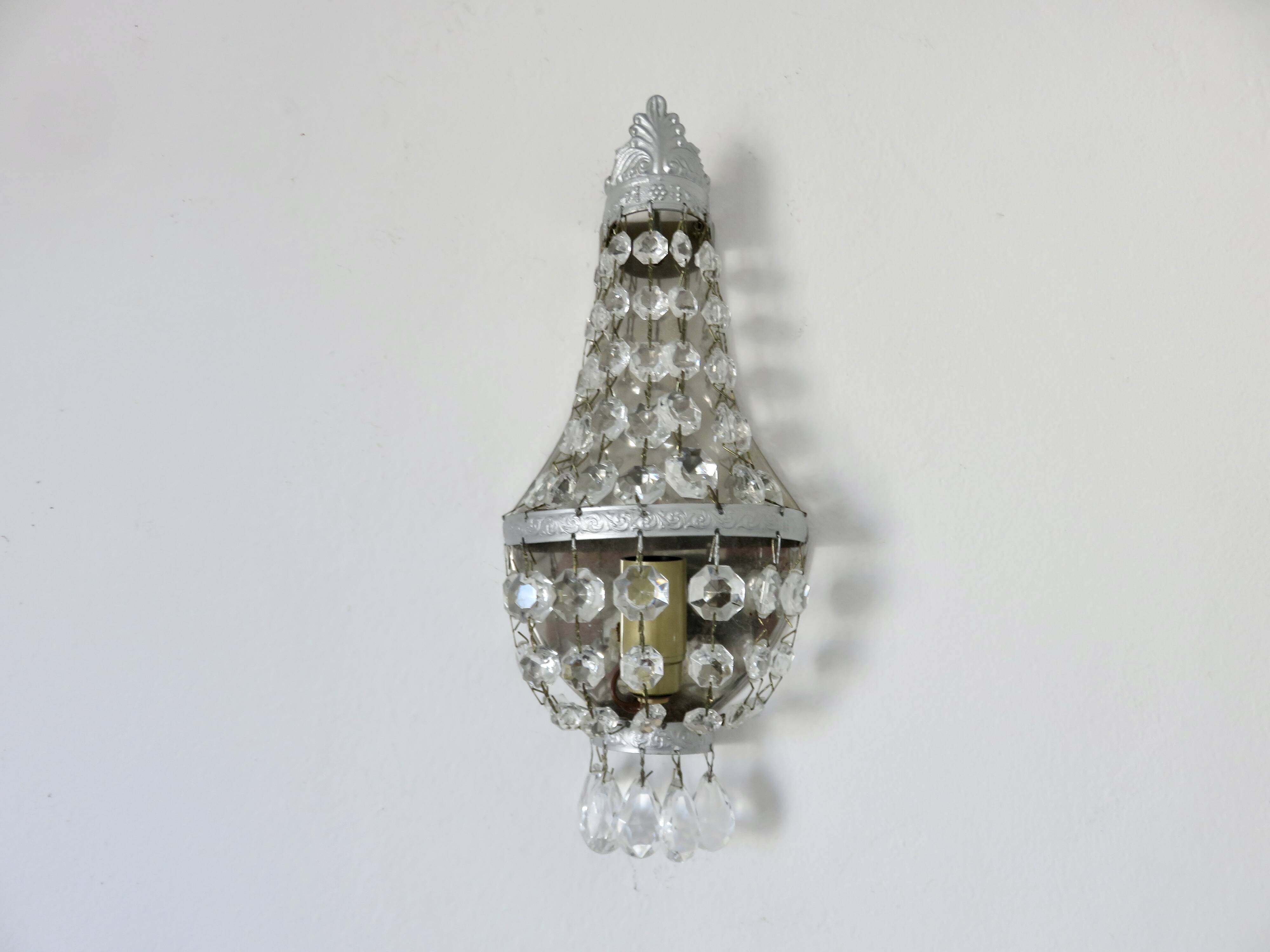 Pair of silver-plated balloon wall lights with pendants, circa 1970.