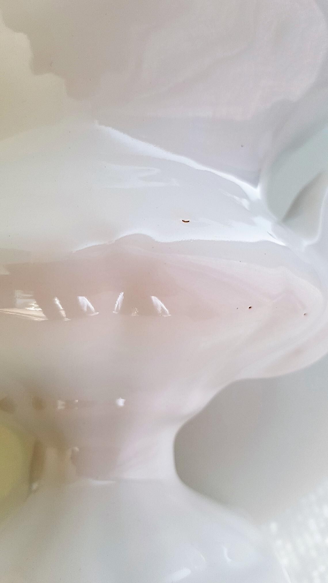 White ceramic medici-shaped planter