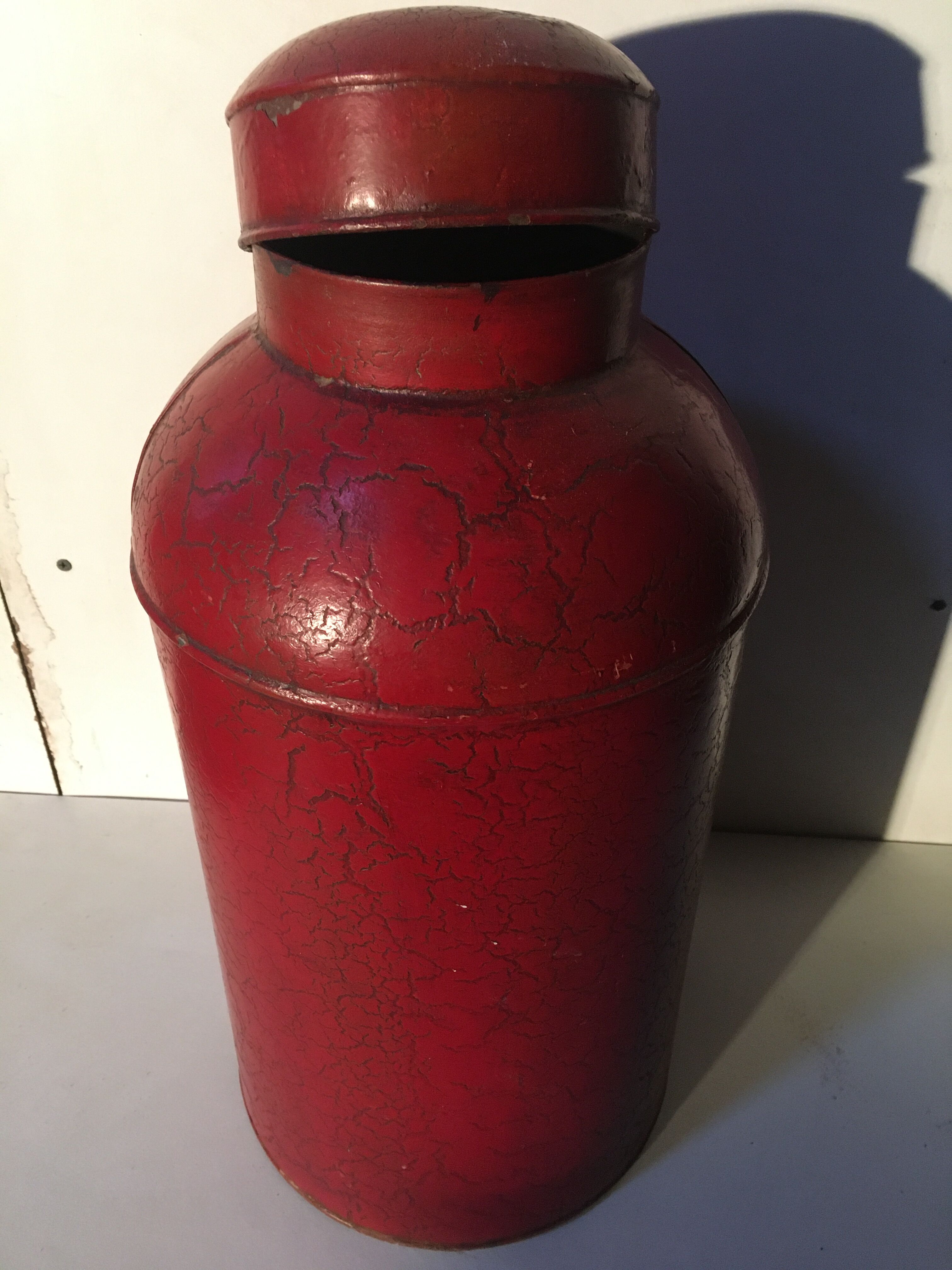 Asian red metal pot with lid