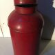 Asian red metal pot with lid