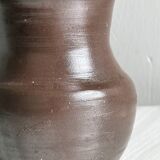 Dark brown ceramic vase, flared shape, smooth finish, classic style