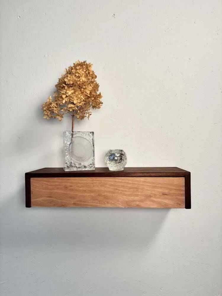 Vintage floating commode in teak and beech wood from the 1960s.