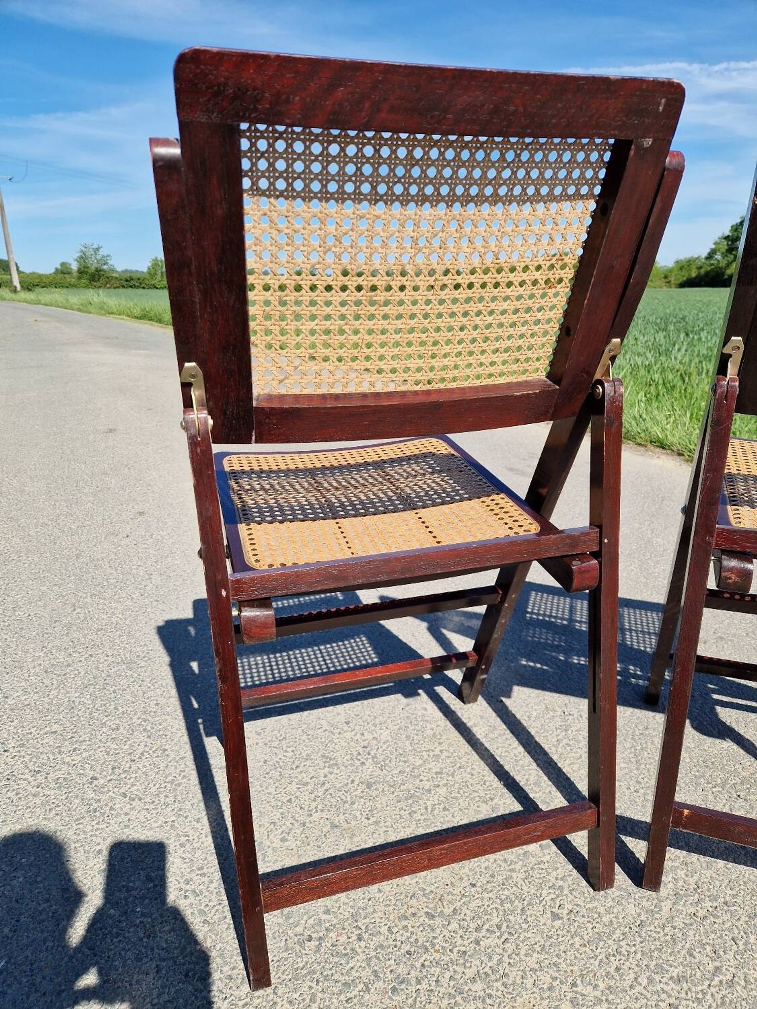 Lot de 2 chaises pliantes en bois et cannage