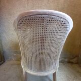 Canned basket armchair