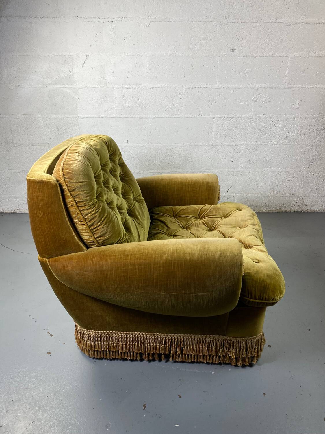 Fauteuil club vintage en tissu vert