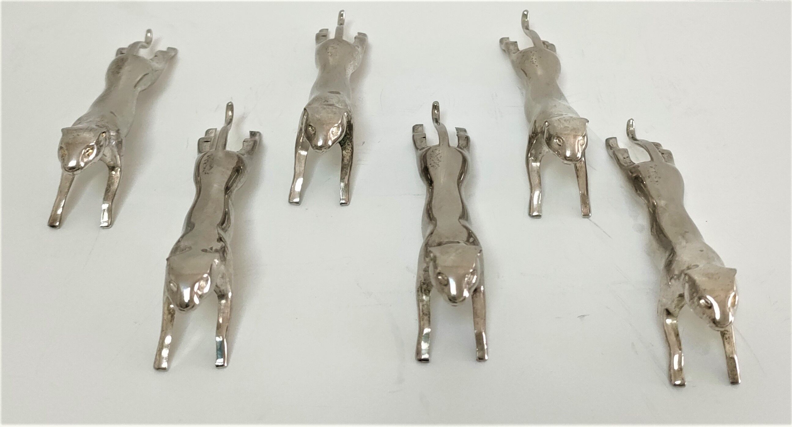 Six panther silver metal knife holders