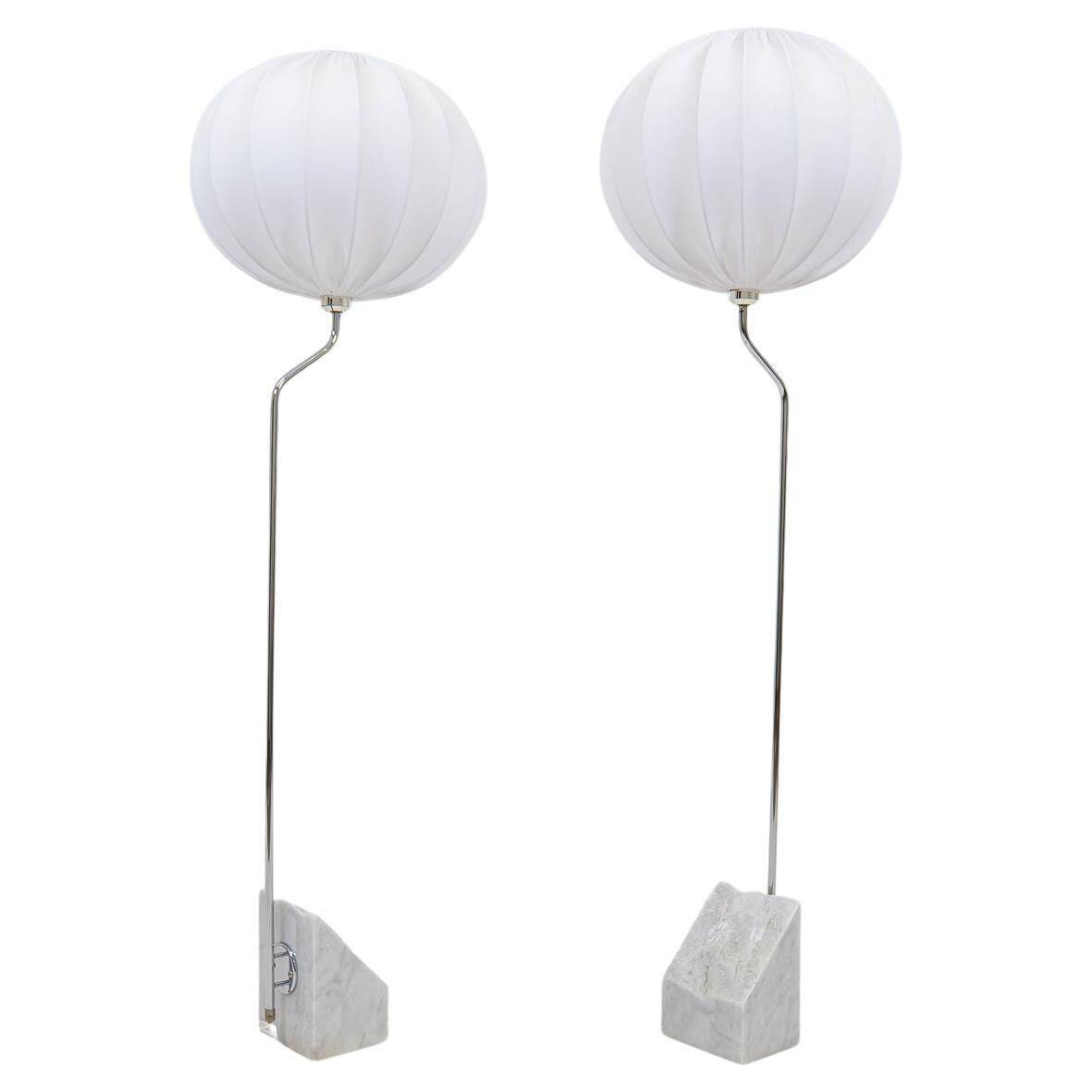 Pair of Bergboms marble and steel floor lamps from the mid-century, 1970s, Sweden.